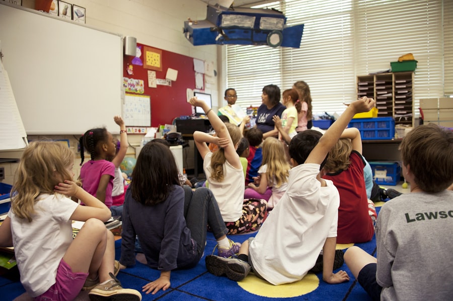 Teacher helping children in class